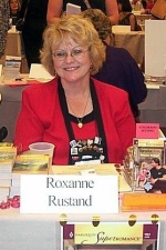 Roxanne at literacy fundraiser booksigning at a RWA national conference