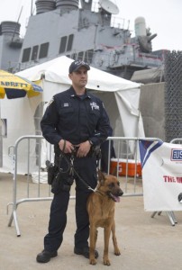 © Zhukovsky | Dreamstime.com - NYPD Counter Terrorism Officer With Belgian Shepherd Providing Security During Fleet Week 2014 Photo